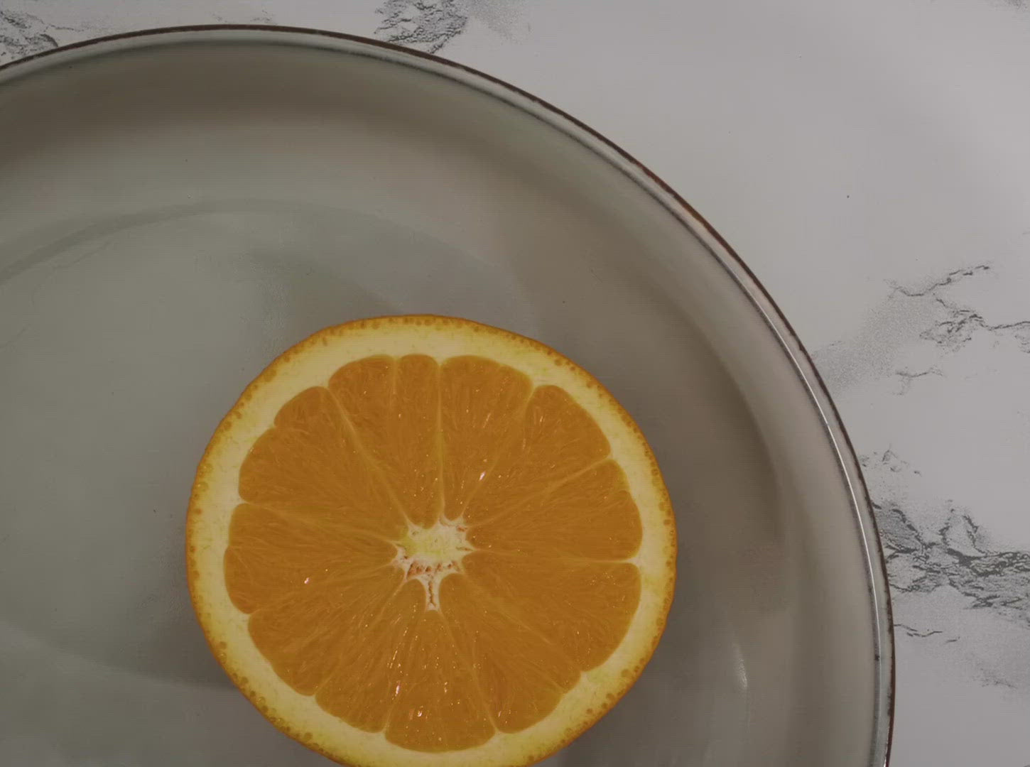 moving image gif of half of an orange 